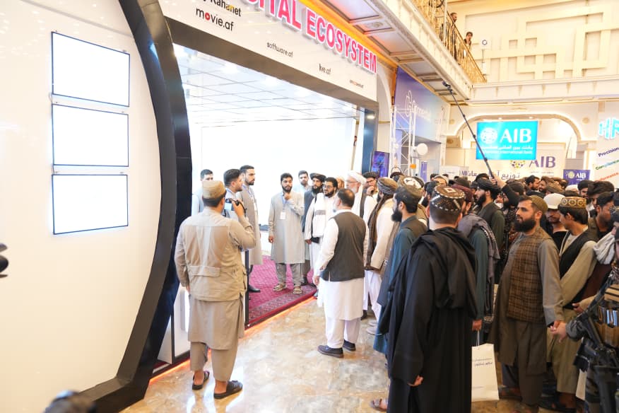Visitors gathered at the entrance of a themed exhibition pavilion