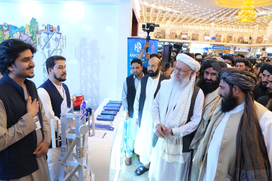 Exhibitor team presenting a product demonstration at their stand